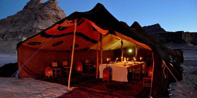 Bivouac and tent under stars